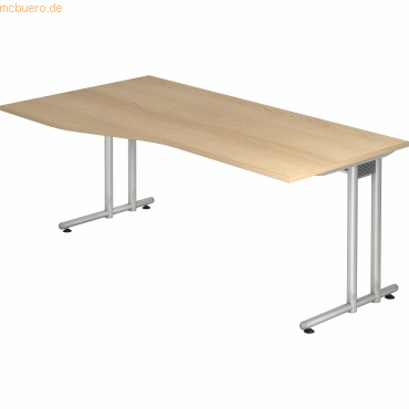 4032062163948 - HAMMERBACHER Prokura Schreibtisch eiche Trapezform C-Fuß-Gestell silber 1800 x 800 1000 cm