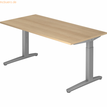 4032062169469 - eurokraft pro ANNY - Schreibtisch mit C-Fußgestell höhenverstellbar 650 - 850 mm Breite 1600 mm Eiche   alusilber